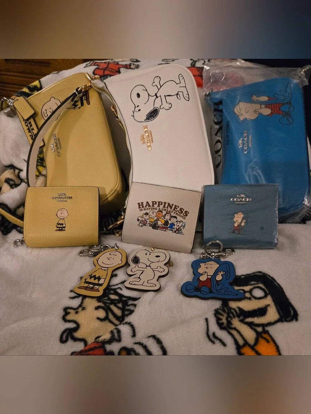 Coach Snoopy Collection Mini Bags & Wallets in White, Yellow, Blue, Cream